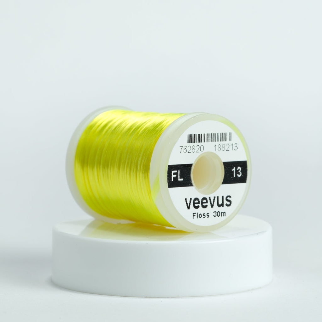 Spool of yellow thread with 'veevus' branding on a white background