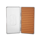 Open Fishpond tacky fly box with a white interior and brown exterior featuring small holes, on a white background.