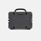 Black hard-shell of Turtlebox Original Gen 3 with handle on a light gray background