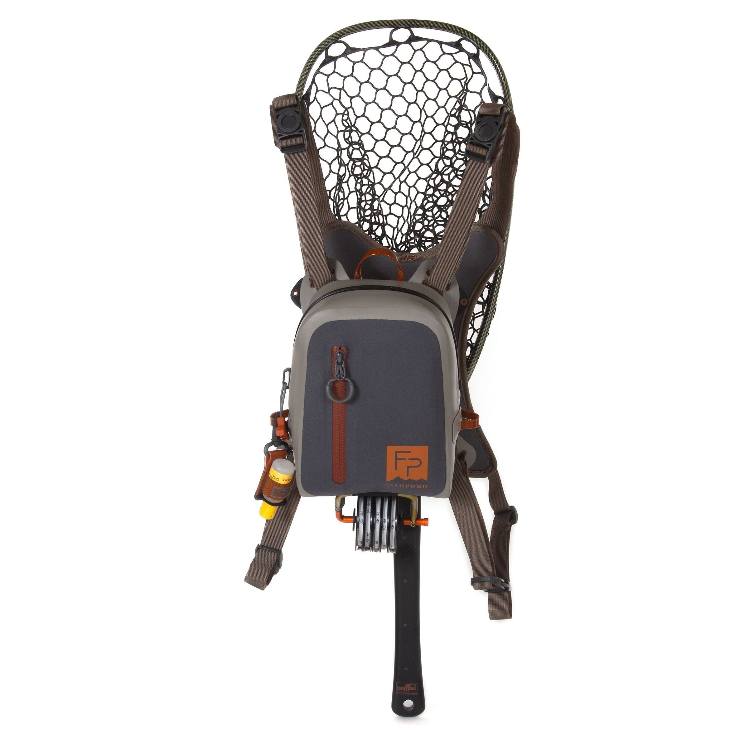 Fishpond Thunderhead® Submersible Chest Pack with fishing net on a white background
