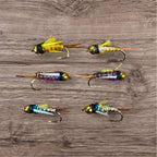 A set of six colorful hand-picked Psycho Prince flies tied to size #12 hooks, displayed on a wooden surface.