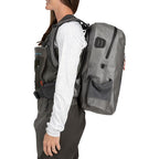 Gray Simms Dry Creek Z Backpack with orange 'Simms' logo on a white background