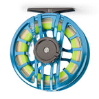 Blue fishing reel with green spool on a white background