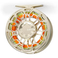 Orvis Ratio silver fly fishing reel with colorful line on a white background