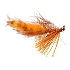 Orange fishing lure with feathers on a white background