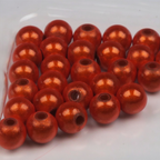 Red Hareline 3D Beads on a white background