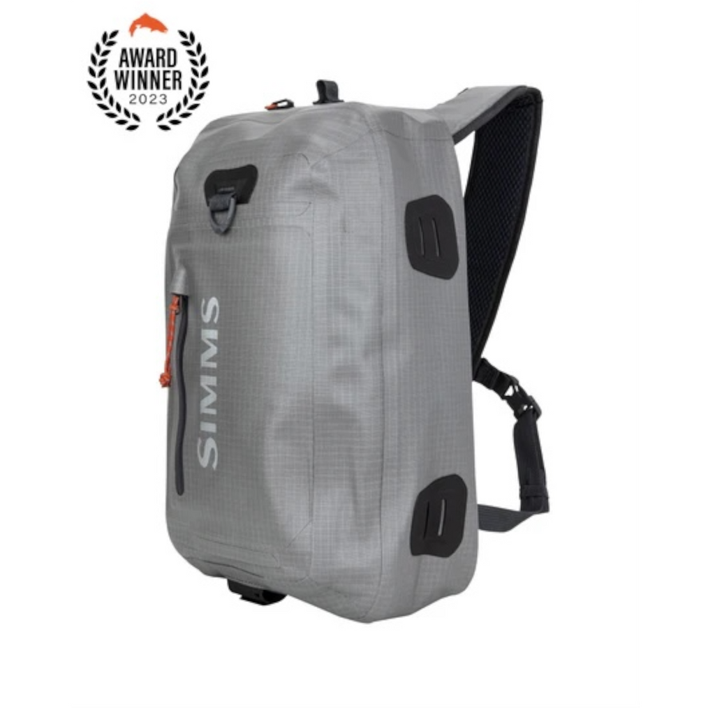 Gray Simms Dry Creek Z Sling Pack with black straps on a white background, featuring the Simms brand logo.