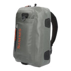 Gray Gray Simms Dry Creek Z Sling Pack with black straps on a white background, featuring the Simms brand logo. 