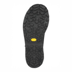 Close-up of a Simms Men's G3 Guide BOA Boot - Vibram black shoe sole with a yellow label on a white background