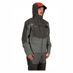 Person wearing a gray and black Simms MEN's G3 Guide Jacket with a red hood on a white background