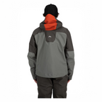 Person wearing a gray and orange Simms MEN's G3 Guide Jacket on a white background