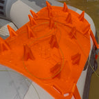Orange SA Launch Pad Drift attached to a boat on a body of water