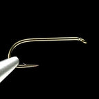 A close-up image of a Daiichi 1560 bronze fly fishing hook.