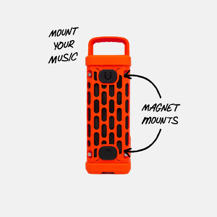 Orange portable speaker with text indicating 'Mount Your Music' and 'Magnet Mounts' on a white background