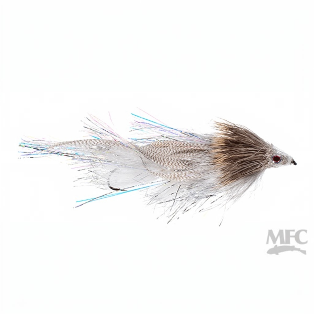 A fly fishing lure with a textured beige and brown body, white hackle feathers, and blue and silver glitter fibers, shown on a plain white background with an MFC logo in the bottom right corner.