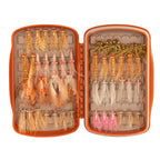 An open orange Fishpond Tacky Pescador small fly box displaying an organized array of fishing flies on a white background