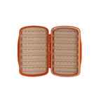 An open orange Fishpond Tacky Pescador small fly box .