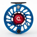 A blue and red Nautilus CCF-X2 fly-fishing reel with a large arbor design.