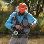 Fisherman wearing a Fishpond Sagebrush Pro Mesh Vest