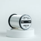 White spool of fly-tying thread with 'veevus' branding on a white background