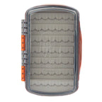 Clear plastic Fishpond fly box with orange accents on a white background