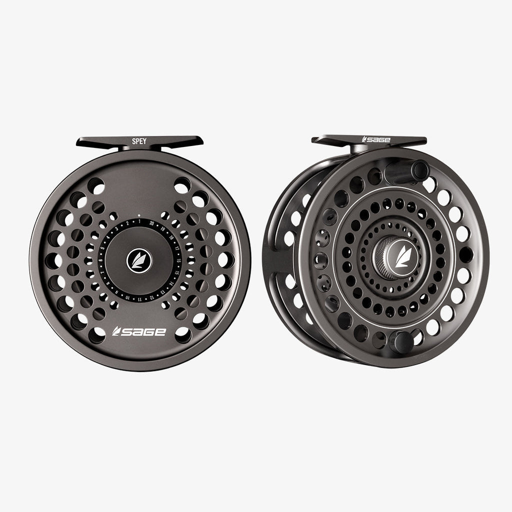 Two Sage Spey II fishing reels, one in black and the other in gray, displayed side by side.