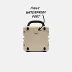 Tan Turtlebox Cub speaker with the handle and 'FULLY WATERPROOF PORT' text on a white background