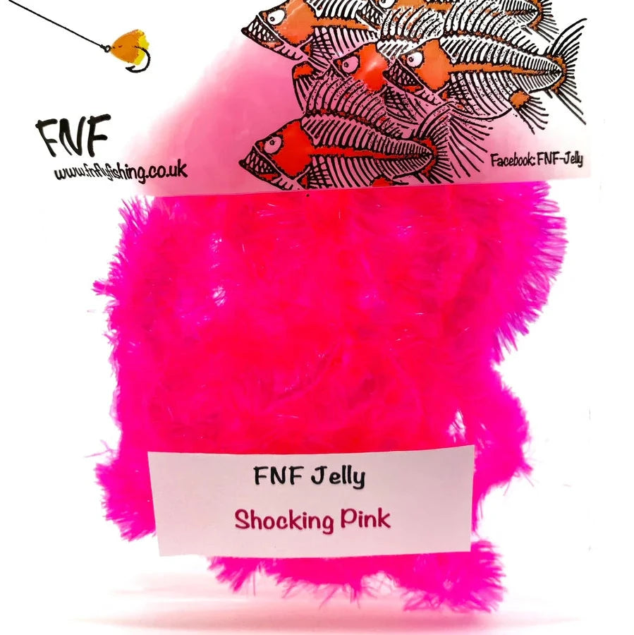 Shocking pink FNF fly tying material on a white background
