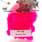 Shocking pink FNF fly tying material on a white background