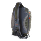 Green and orange Fishpond Stormshadow Sling Pack on a white background