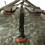 Camouflage duffel bag with zippers and straps on a white background