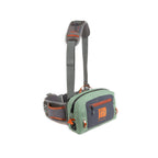 A green Fishpond Thunderhead Small Submersible Lumbar pack with a brown shoulder strap and zippered closures, featuring a logo on the front.