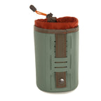 Green and brown bottle holder with orange interior on a white background