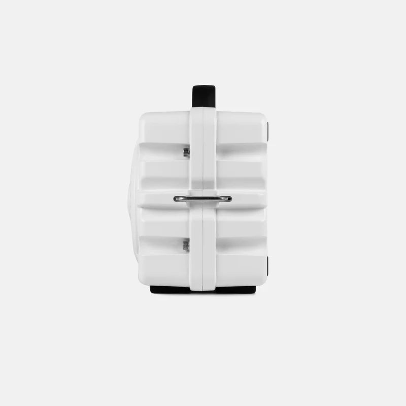 White Turtlebox Original Gen 3 speaker with black accents on a light gray background