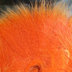 Colorful fox tail hair on a wooden surface