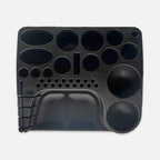 Black Loon Bench Boss tray with various-sized round cavities on a white background