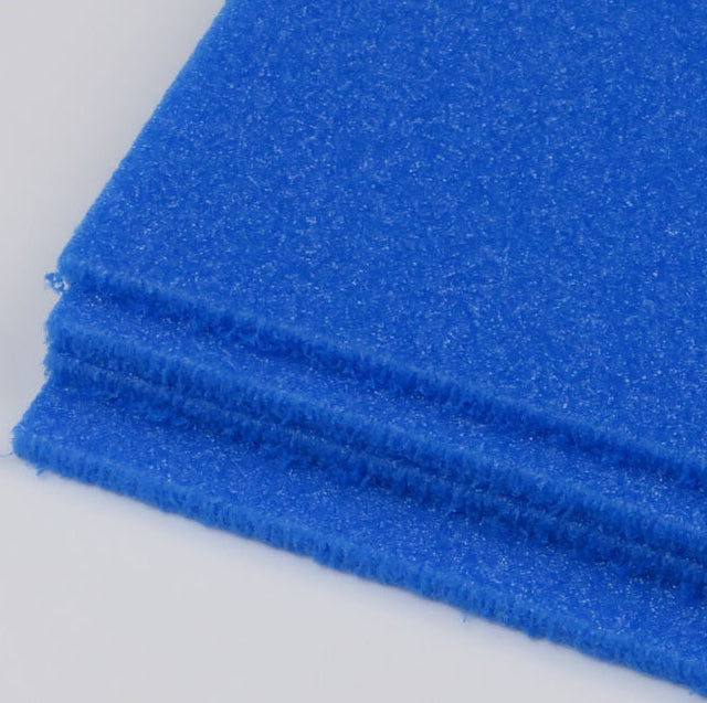 Close-up of blue Hareline Upavon Premium HD Foam Sheets on a white background