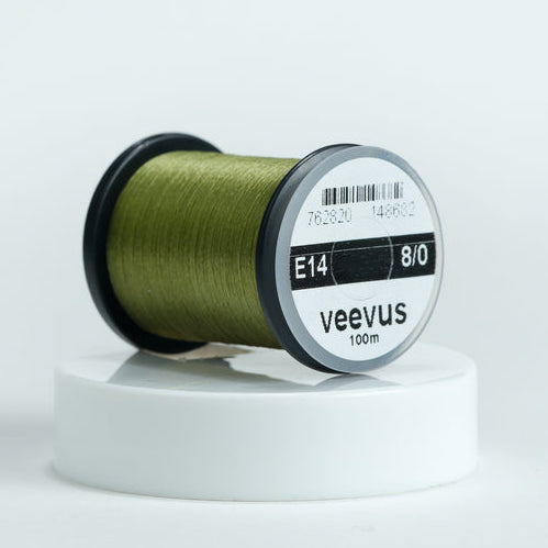 Spool of olive Veevus Thread Polyester 8/0 with 'veevus' branding on a white background