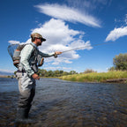 Fisherman wearing a Fishpond Ridgeline Backpack