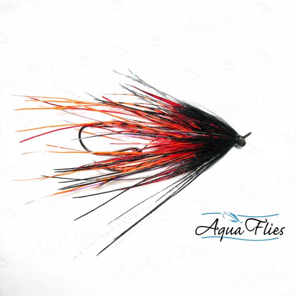A fly fishing lure with a black body, red and orange feathering, and a single hook, shown on a white background with an Aqua Flies logo watermark.