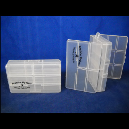 Two clear plastic fly fishing box containers on a blue background