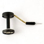 A Rite Bobbin Shorty with a black and green handle, a silver metal guide, isolated on a white background. This is for fly tying.