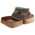 Open Fishpond beige and orange fly tying travel packing bag with gray interior on a white background