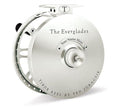 A collection of Tibor fly fishing reels in different colors displayed horizontally. The reels are labeled with their model names.