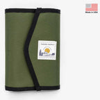 Green Yakoda STS Stash with Umpqua branding held with black strap and a label on a white background