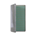 A clear polycarbonate Fishpond Tacky The Original 2X fly box with a green silicone bottom, featuring a latchless magnetic closure.