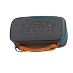 A medium-sized Fishpond Ripple Reel Case in blue with gray accents, featuring a waterproof and impact-resistant bottom, a coated mesh zippered pocket, and a signature rope handle.