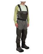 Person wearing a pair of Simms MEN's G3 Guide Stockingfoot Waders on a white background