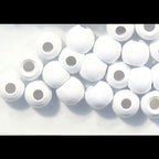 White Hareline Dazzle Brass Beads with holes on a white background