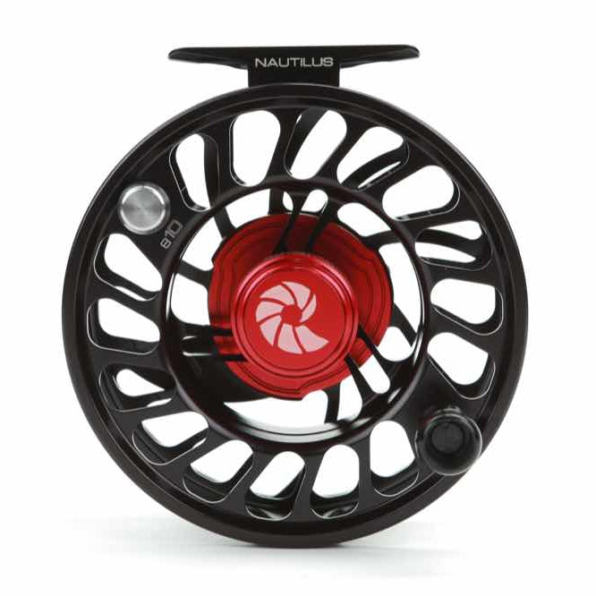 A black and red Nautilus CCF-X2 fly-fishing reel with a large arbor design.